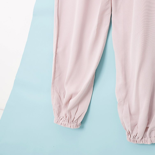 Світло-рожевий жіночий комбінезон з ґудзиками