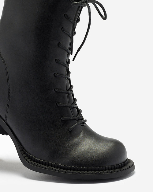 Чоботи жіночі чорні з ботильйонами на стовпі Caretti. Взуття