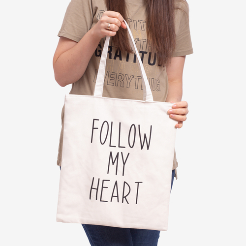 Біла тканинна сумка з написом