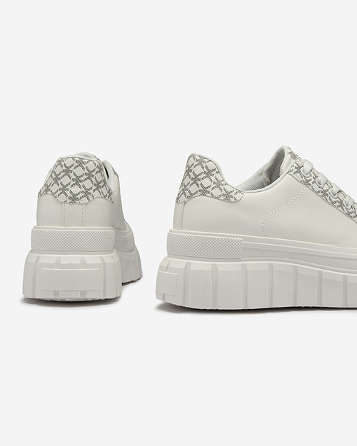 Повсякденні жіночі спортивні кросівки білого кольору з візерунчастими вставками Leritic - Взуття