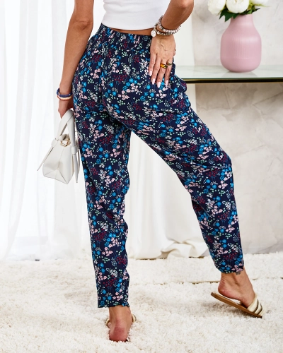 Royalfashion Námořnicky modré dámské látkové kalhoty s barevnými květy
