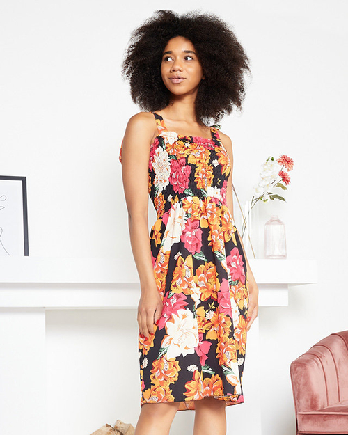 Помаранчево-рожева коротка сукня з візерунком