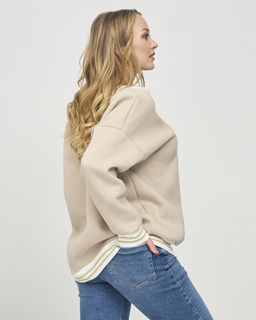 Жіноча утеплена кофта бежевого кольору - Одяг