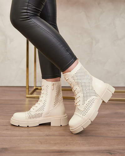 Prolamované béžové dámské kozačky na plochých podpatcích Rolika - Footwear