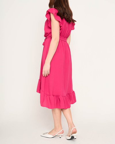 Жіноча сукня кольору фуксії з рюшами
