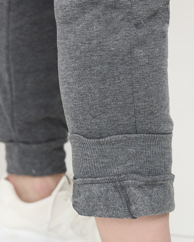 Жіночі утеплені спортивні штани сірого кольору - Одяг