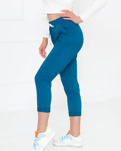 Dámské látkové kalhoty v tyrkysové barvě- Oblečení