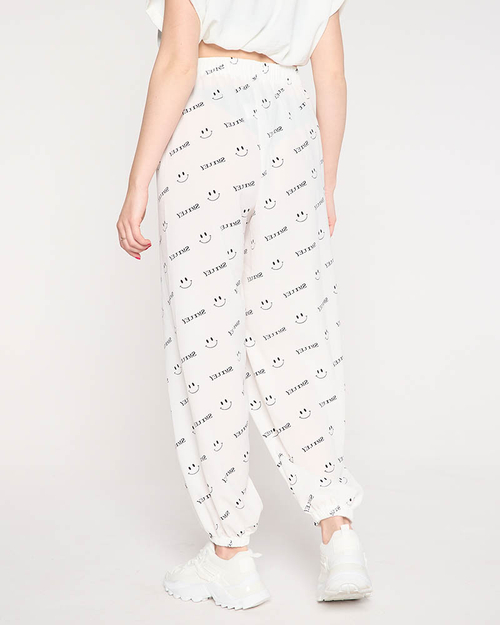 Білі жіночі штани з принтом