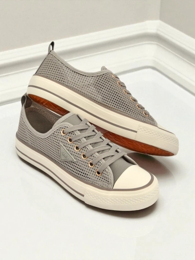 Royalfashion Жіночі перфоровані кросівки Rebbse