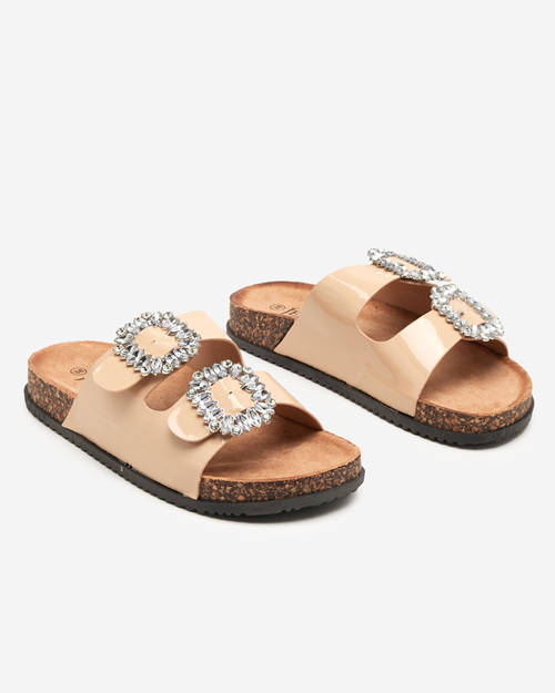 Бежеві жіночі шльопанці з декорованими застібками Olimika