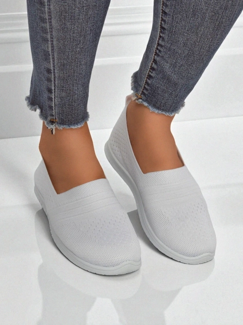 Білі жіночі балетки Ariadne з дихаючої тканини на плоскій підошві