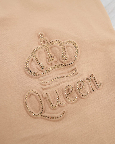 Жіночі бежеві спортивні штани з фіанітами - Одяг