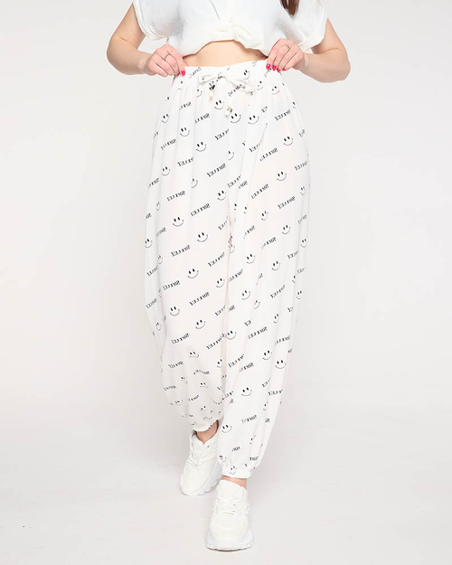 Білі жіночі штани з принтом