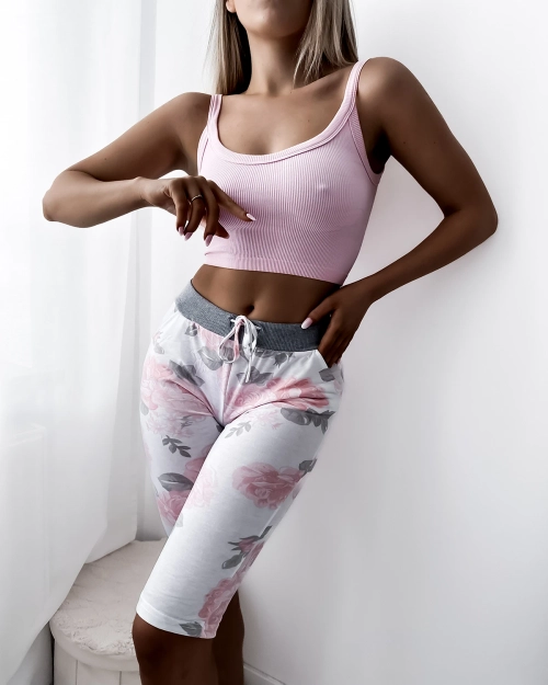 Білі жіночі шорти з квітковим принтом