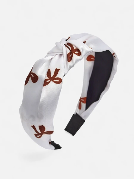 Royalfashion Saténová čelenka do vlasů s pletením a potiskem