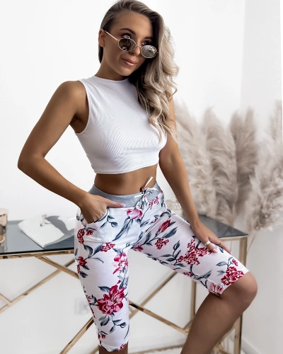 Біло-рожеві жіночі шорти 3/4 з принтом PLUS SIZE - Одяг
