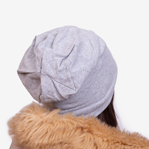 Світло-сіра жіноча утеплена шапка