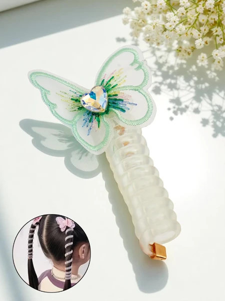 Royalfashion Gumička do vlasů pružina s motýlkem Spring Butterfly