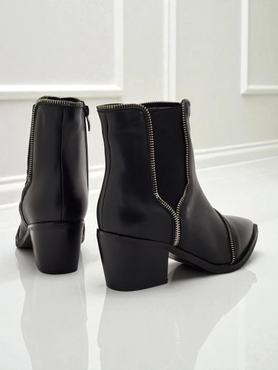 Dámské kotníkové boty z eko kůže na sloupkovém podpatku Omen Glade