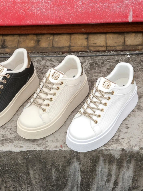 Royalfashion Жіночі спортивні кросівки з декоративними шнурівками Eone