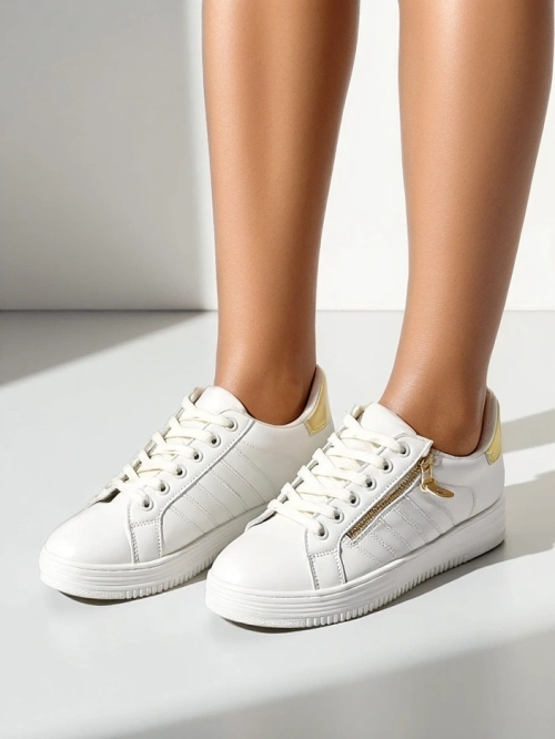 Royalfashion Жіночі спортивні кросівки з декоративною застібкою Evrove