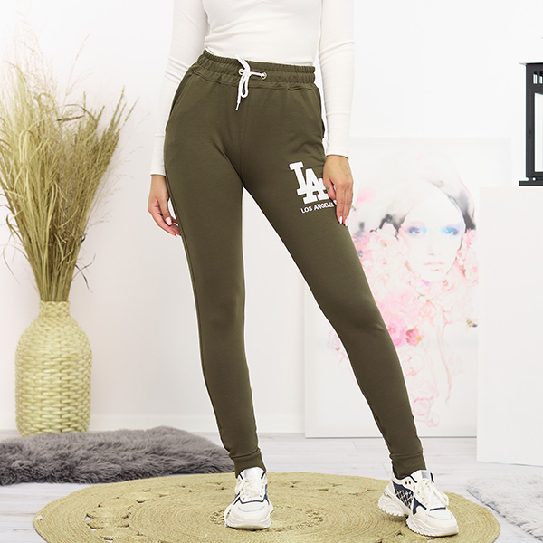 Жіночі темно-зелені спортивні штани з кольоровою нашивкою - Одяг