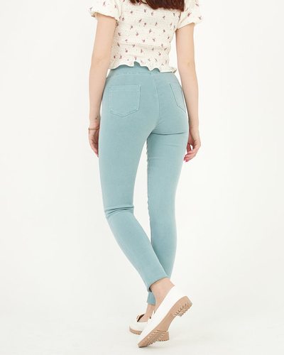 Жіночі штани м'ятно-зеленого кольору з декоративними ґудзиками