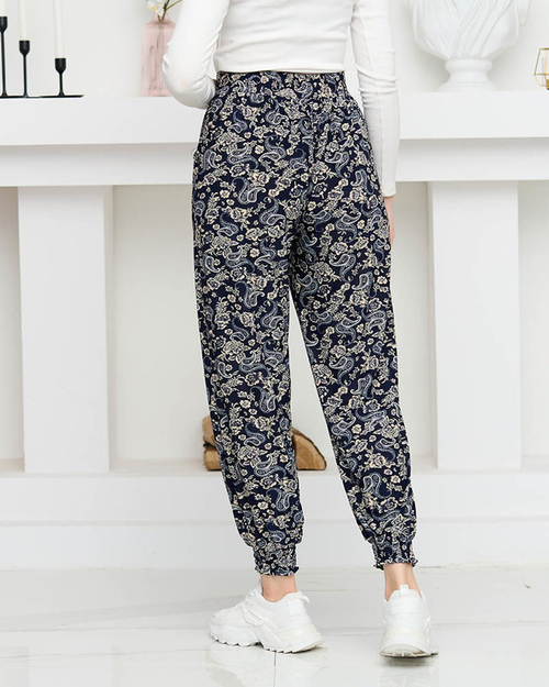 Темно-сині жіночі штани з бежевим принтом PLUS SIZE - Одяг