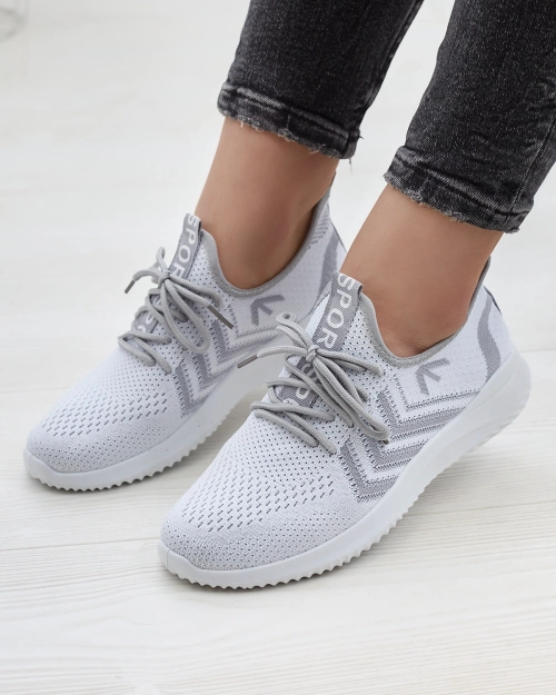 Тканинні жіночі спортивні кросівки білого кольору Leridis - Взуття