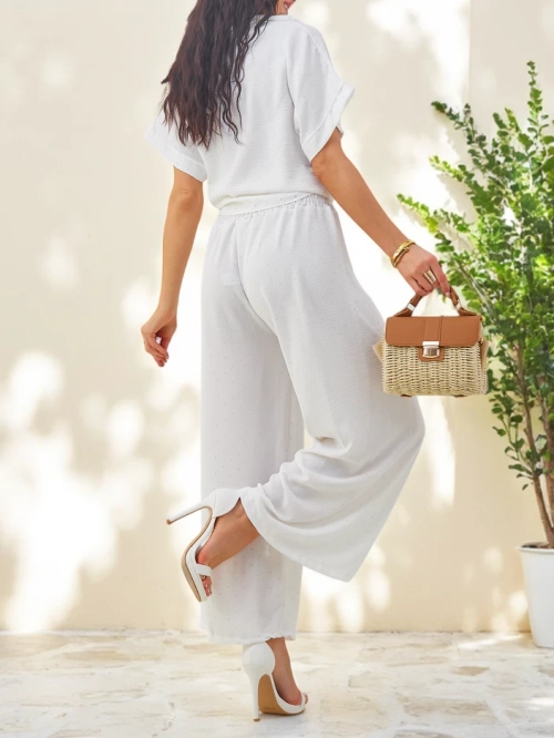 Royalfashion Жіночий комплект з зав'язаною сорочкою з коротким рукавом і розкльошеними штанами з стразами