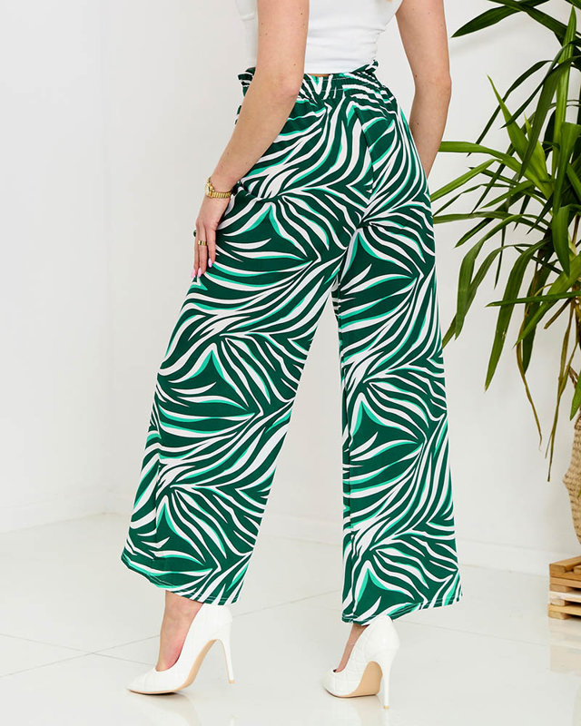 Vzorované dámské palazzo kalhoty v zelené barvě- Oblečení