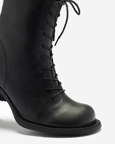 Чоботи жіночі чорні з ботильйонами на стовпі Caretti. Взуття