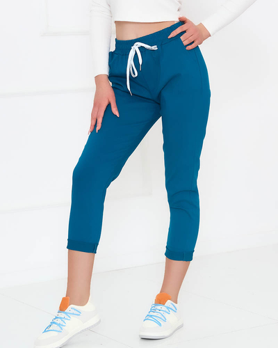 Dámské látkové kalhoty v tyrkysové barvě- Oblečení