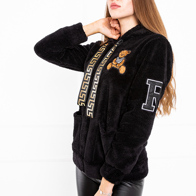 Чорний жіночий светр на блискавці з нашивками