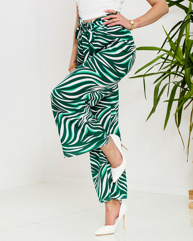 Vzorované dámské palazzo kalhoty v zelené barvě- Oblečení