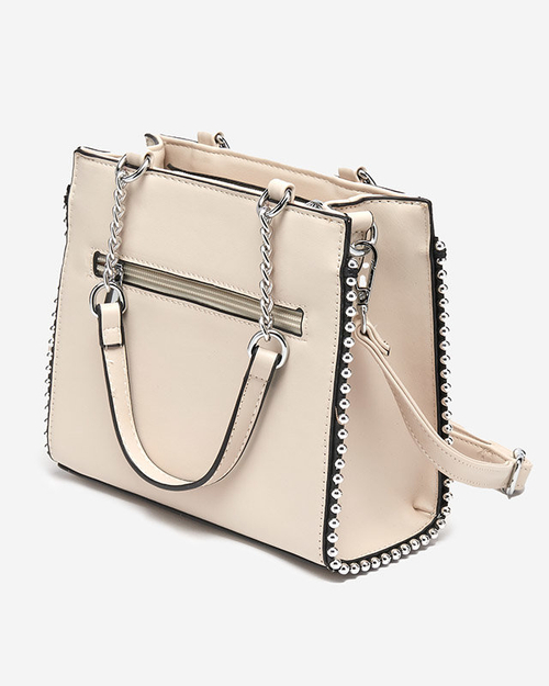 Бежева жіноча сумочка з плетеною вставкою