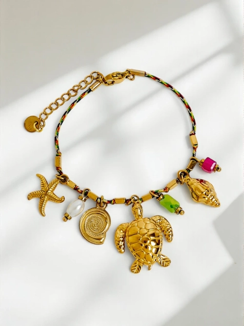 Браслет Aphrodite Maretta позолочений з морськими підвісками та перлинкою