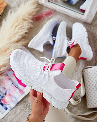Білі жіночі кросівки з рожевими вставками Baym
