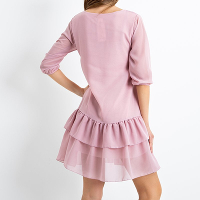 Рожева жіноча сукня з воланами