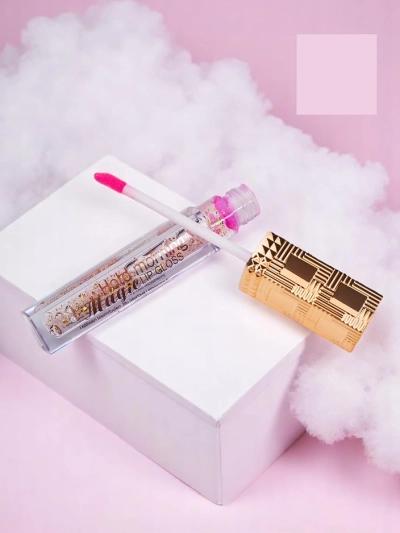 Безколірний блиск для губ 24K з зручним зволоженням і золотими частинками