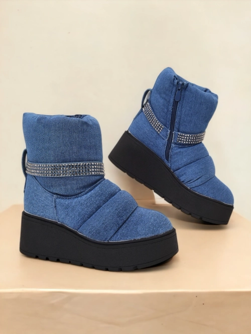 Royalfashion Жіночі снігові чоботи на танкетці Renosi