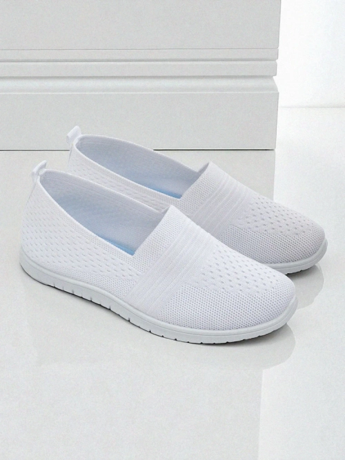 Білі жіночі балетки Ariadne з дихаючої тканини на плоскій підошві