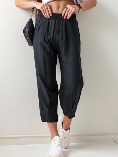 Royalfashion Jednoduché dámské látkové kalhoty 7/8