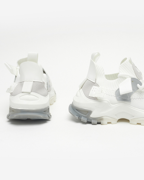 Біле жіноче спортивне взуття на масивній підошві Tiroka - Взуття