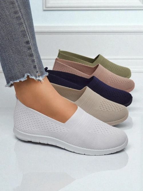 Білі жіночі балетки Ariadne з дихаючої тканини на плоскій підошві