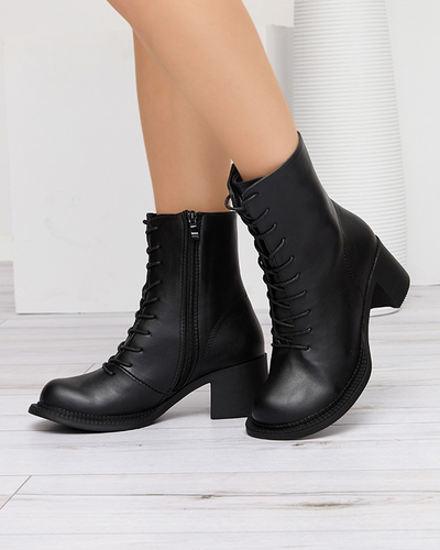 Чоботи жіночі чорні з ботильйонами на стовпі Caretti. Взуття