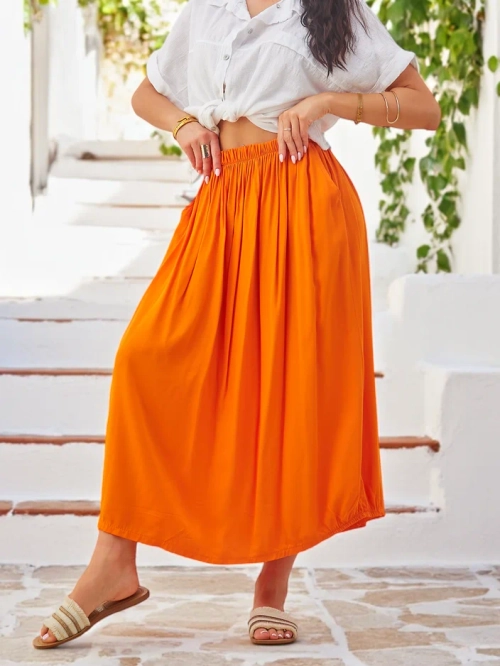 Royalfashion Жіноча віскозна міді-спідниця Літня легка з двома кишенями