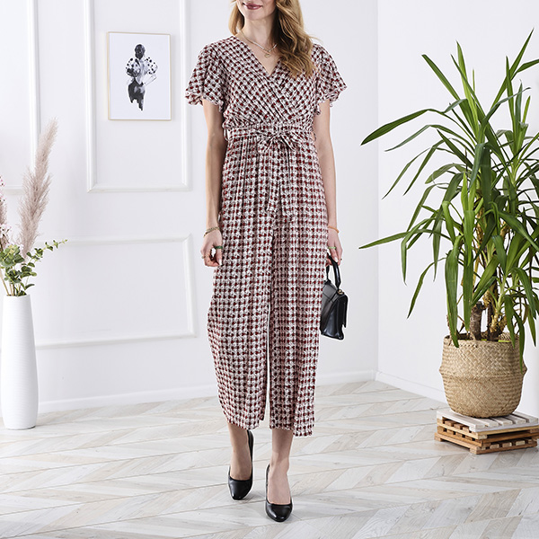 Vzorovaný dlouhý dámský overal s vázáním v červené barvě- Oblečení