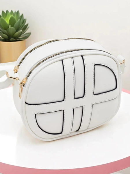 Royalfashion Malá dámská kulatá kabelka z eko kůže Riva Circle