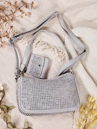 Royalfashion Malá dámská taška s nýty
